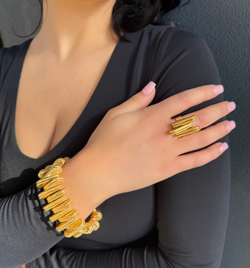 On Model in black shirt. Vintage Retro Ring Gold Link Ring and Matching Bracelet by Cartier