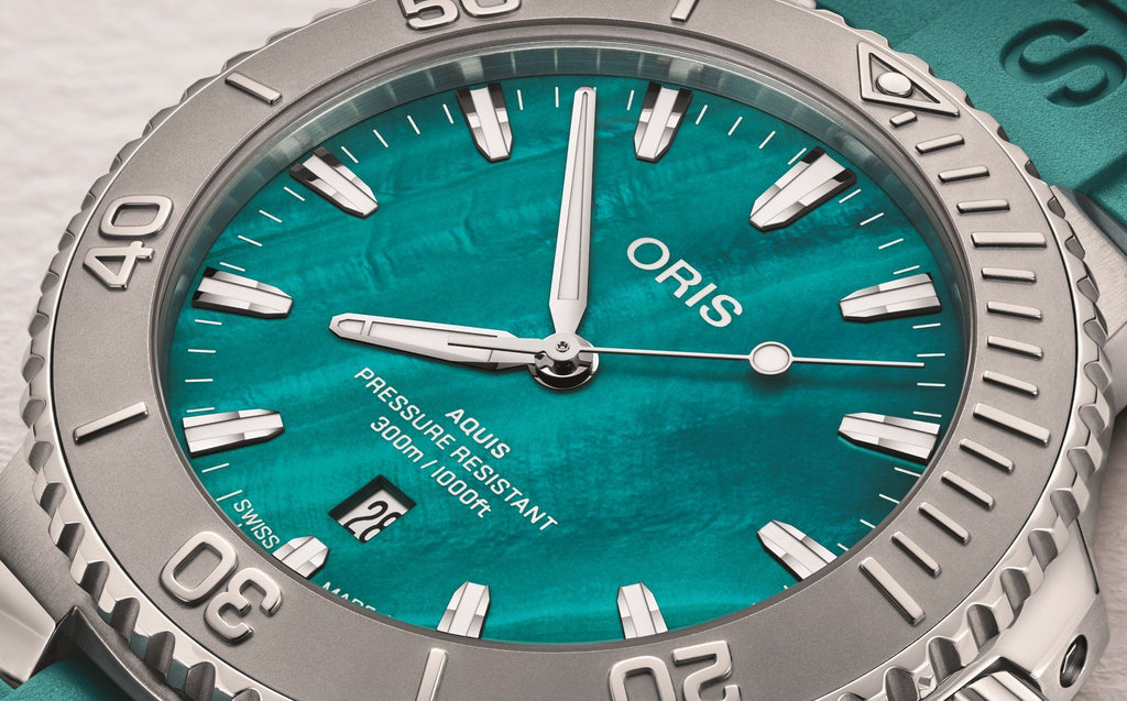 Detailed close-up of the Oris New York Harbor Limited Edition II featuring an aqua green mother-of-pearl dial with oyster-shell effect.