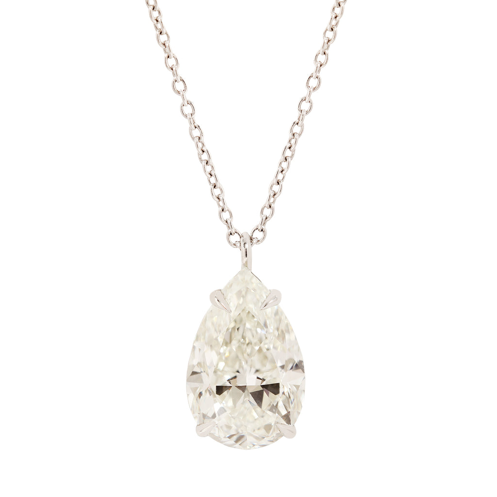 Solitaire pear diamond drop necklace featuring a 6.05 carat diamond in a platinum setting.