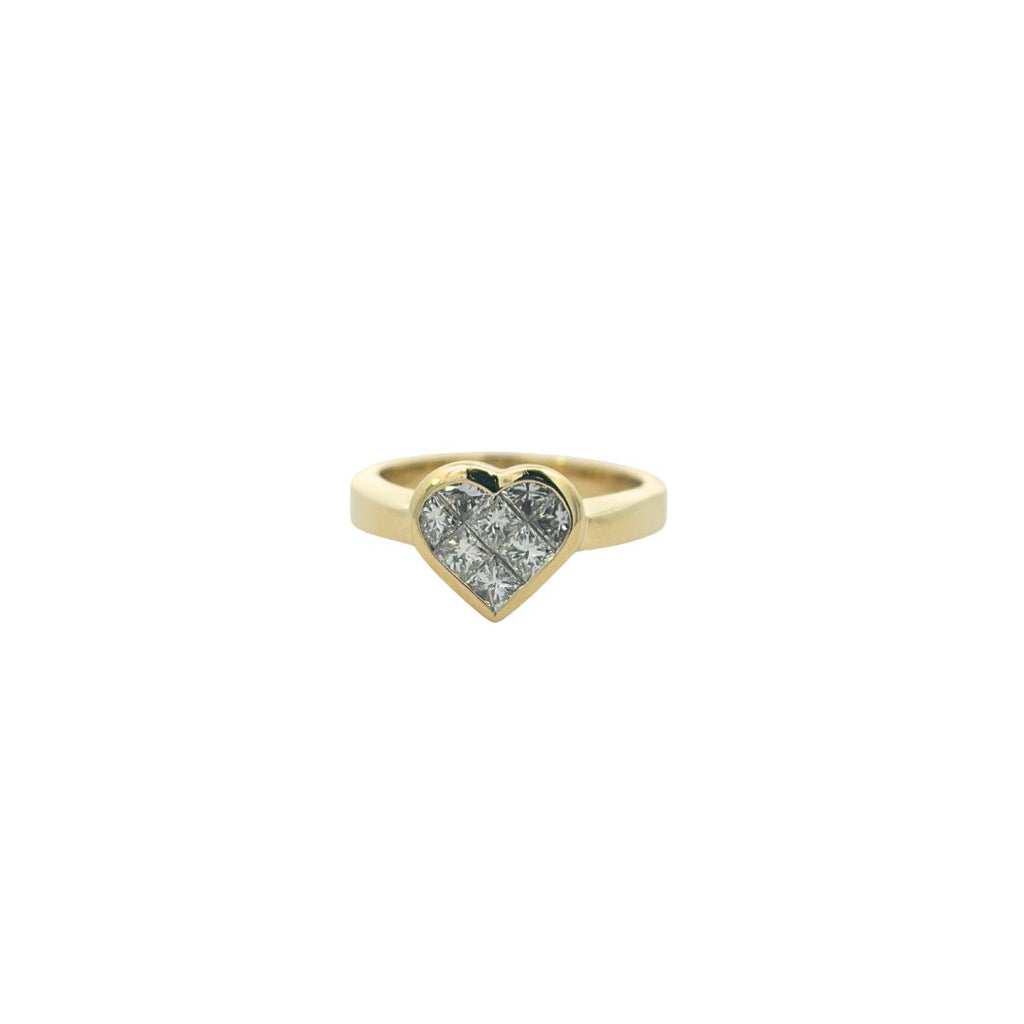 Front view of an 18K gold heart ring with invisible-set diamonds enclosed by a polished heart-shaped bezel.