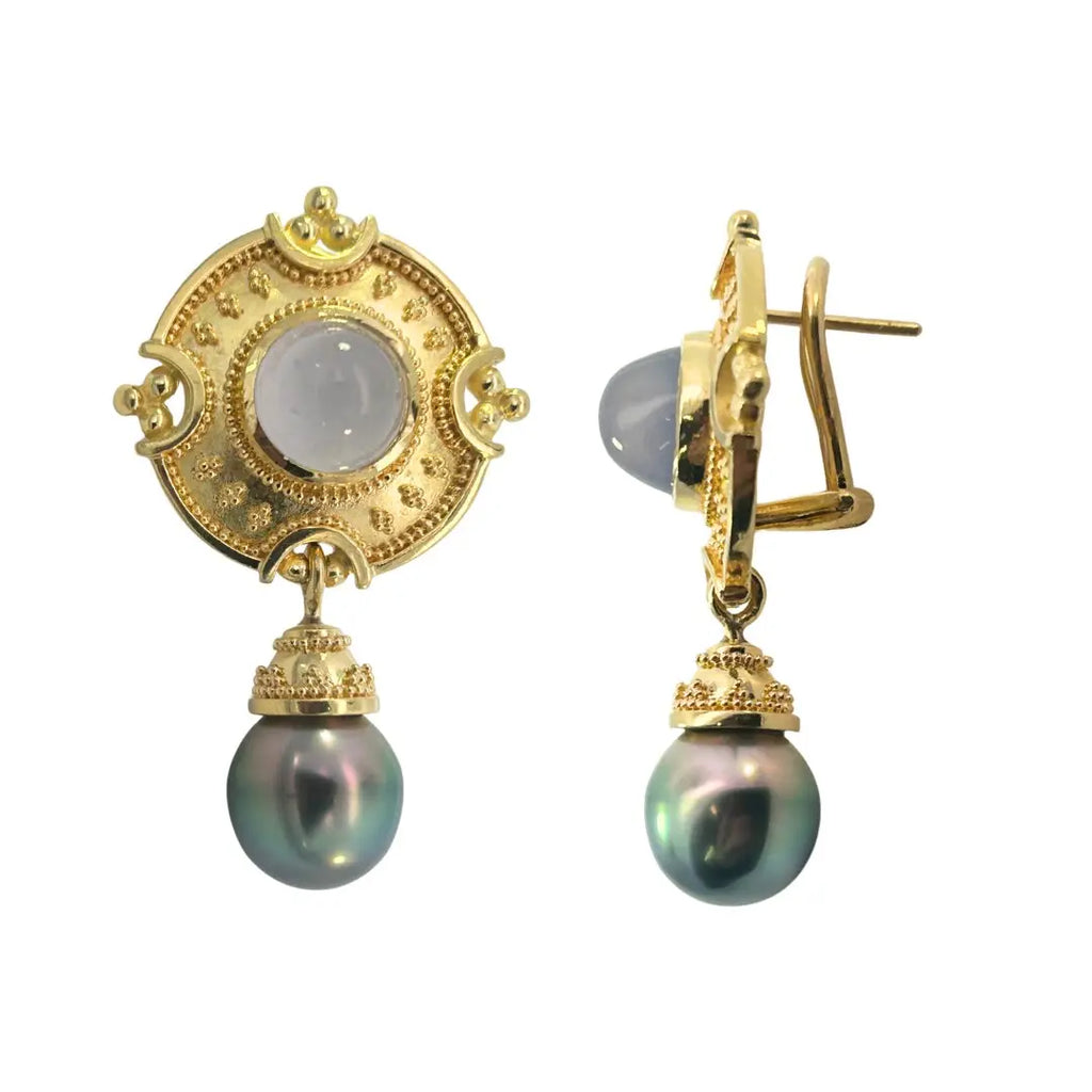 Estate 18k yellow gold earrings featuring blue chalcedony cabochon centers in granulated gold discs with Tahitian pearl drops, artisan style with clip post backs. Side view.