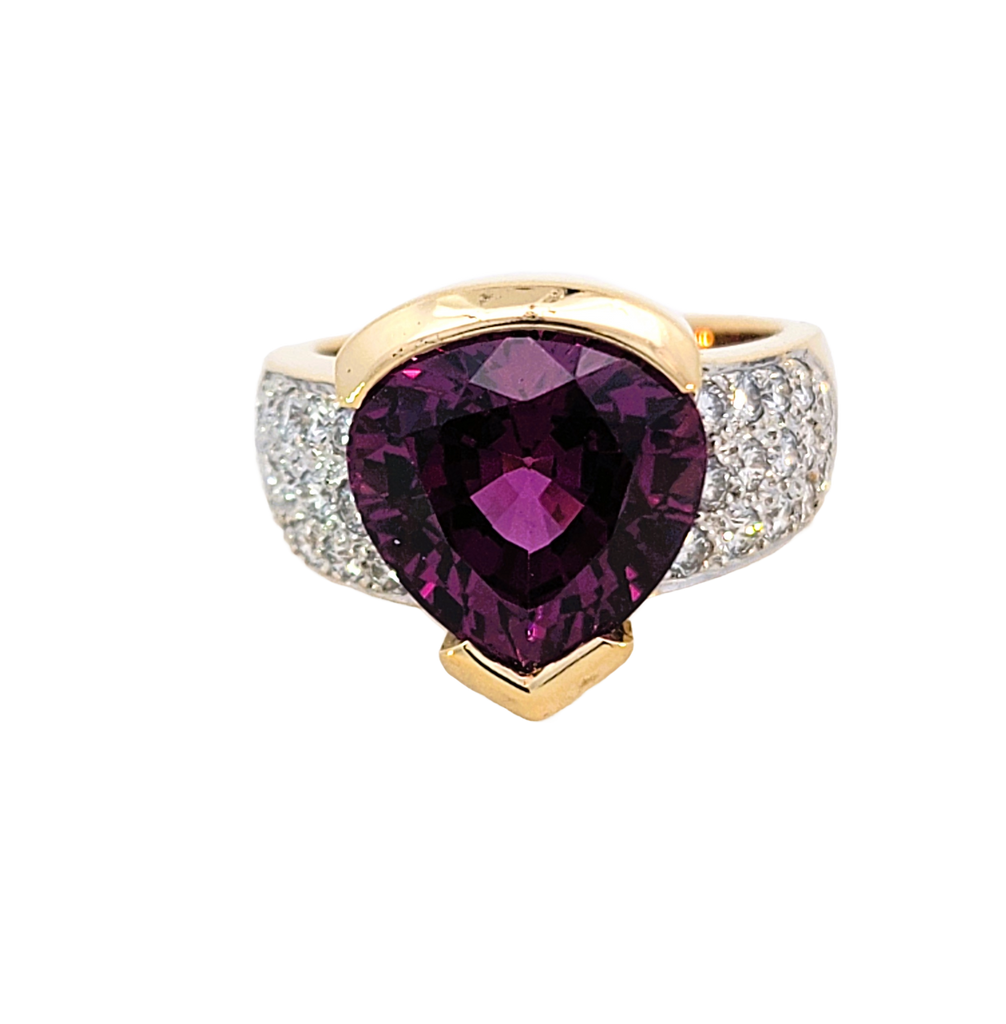 18K gold ring with a pear-shaped Rhodolite garnet, diamond pave band, designed by Barbara Westwood.