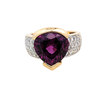 18K gold ring with a pear-shaped Rhodolite garnet, diamond pave band, designed by Barbara Westwood.