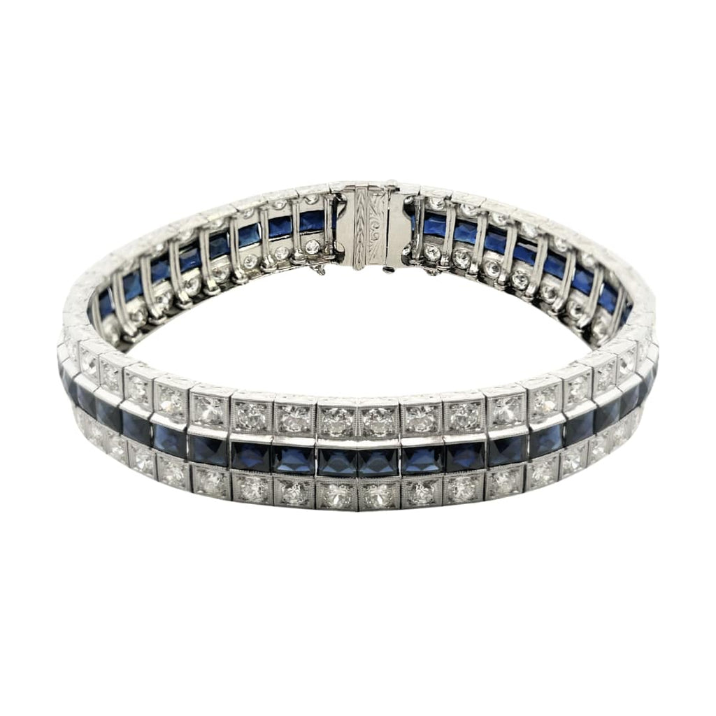 Art Deco platinum bracelet with channel set French cut synthetic sapphires and diamond borders