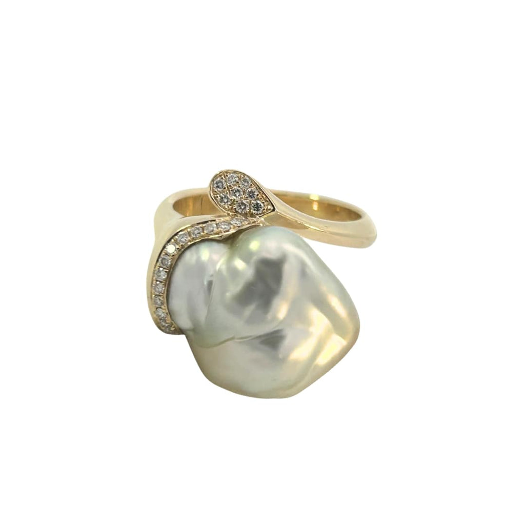Front view of baroque South Sea pearl ring featuring pavé-set diamonds in 18k yellow gold