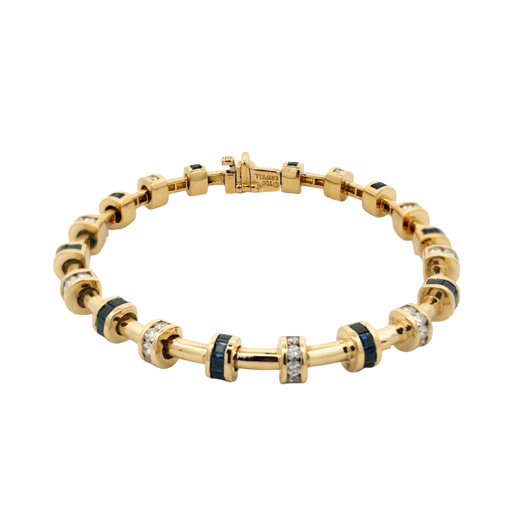 18K yellow gold CHARLES KRYPELL station bracelet with square sapphires and round diamonds in a signature tube design.