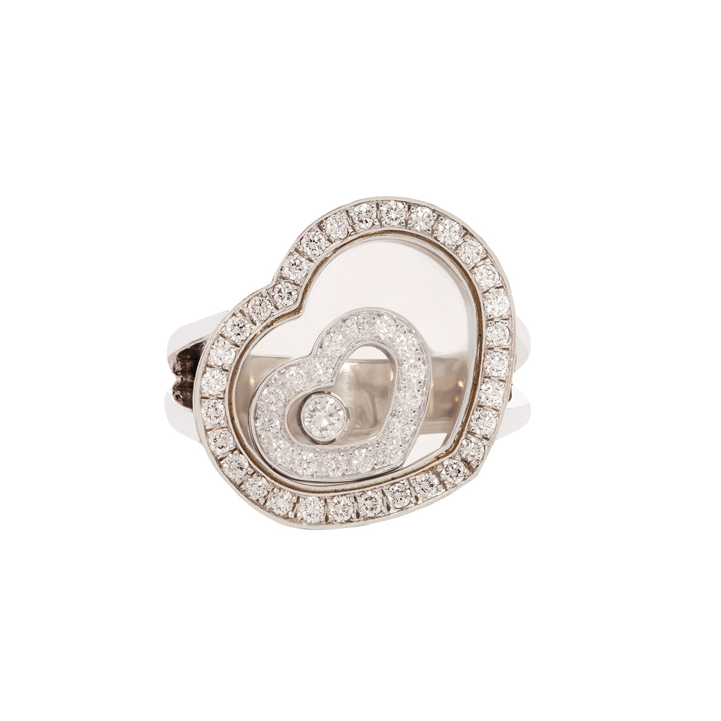 Chopard Happy Spirit heart-shaped ring in 18K white gold with floating diamond and diamond pavé concentric hearts.
