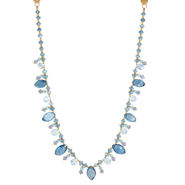  Elegant Clare Ullman necklace with faceted blue topaz, apatite, and tanzanite briolettes. 18K gold stylized clasp.