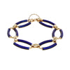 Estate bracelet with cobalt blue enamel oval links, 18K gold connectors, and safety chain clasp.