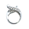 Side profile of 14K white gold diamond bypass ring showing elevated ends