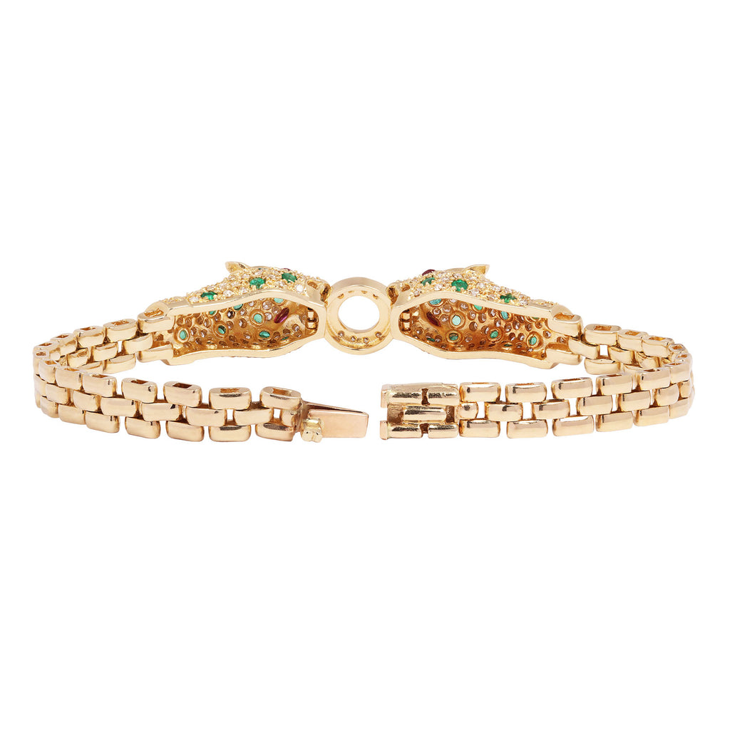 Back view of a 14K yellow gold leopard bracelet featuring pavé diamonds, emerald accents, and a diamond center ring clasp.