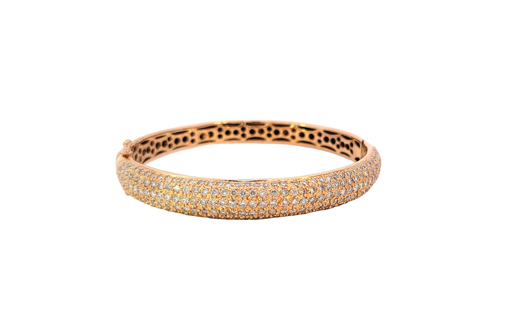 18K yellow gold domed bangle with 205 pave-set diamonds, hinged design, and secure concealed clasp.