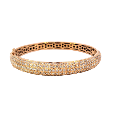 18K yellow gold domed bangle with 205 pave-set diamonds, hinged design, and secure concealed clasp.