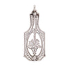 Back view of an Edwardian platinum diamond flower basket pendant and pin featuring openwork design and hinged bail.