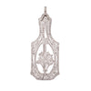 Front view of an Edwardian platinum pendant and pin showcasing a diamond flower basket motif in an open oval frame.