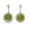 Stunning two-tone 18K gold drop earrings with large round peridots, diamond halo, and secure post-back closure.