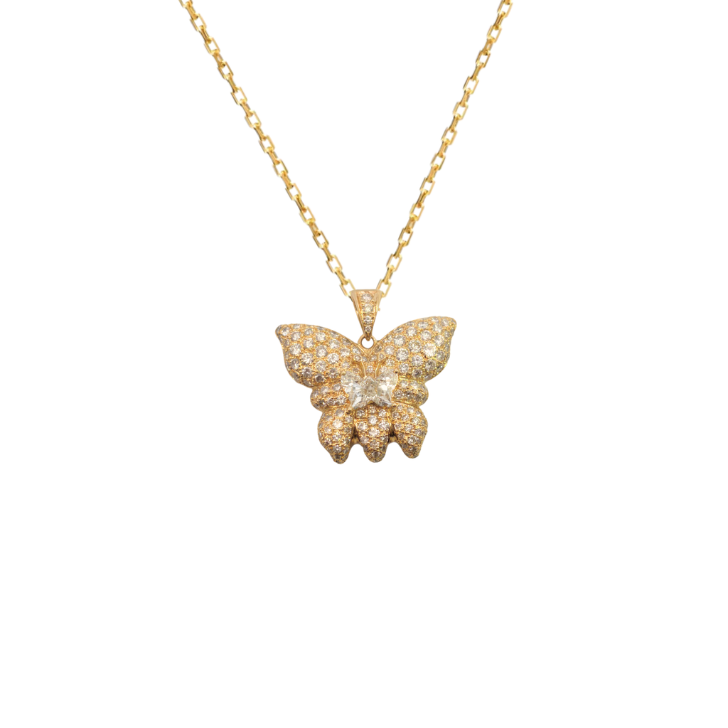 French 18K yellow gold diamond butterfly pendant with pavé wings and a butterfly-shaped center diamond, shown suspended from a gold chain.
