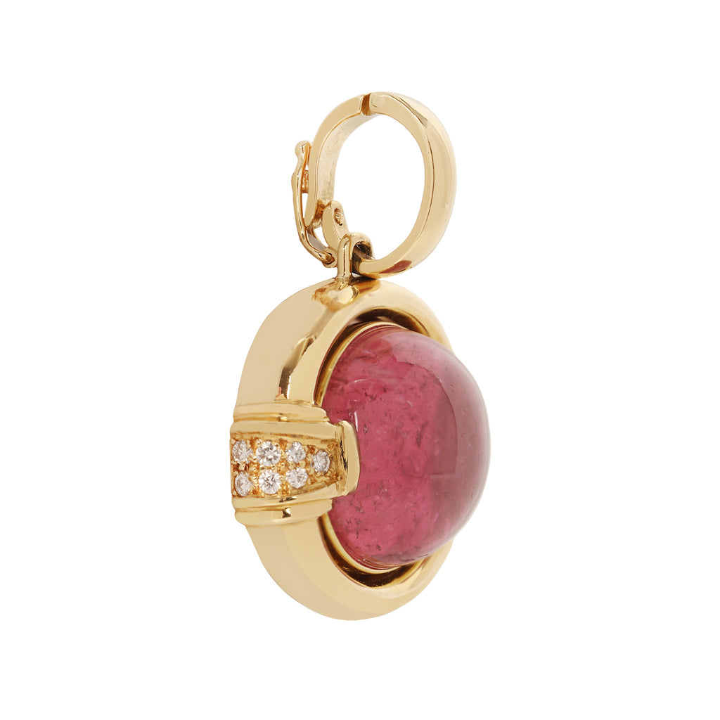 Gump's 18K gold pendant with a pink horizontal tourmaline cabochon, diamond accents, and a hinged bail design. Side view