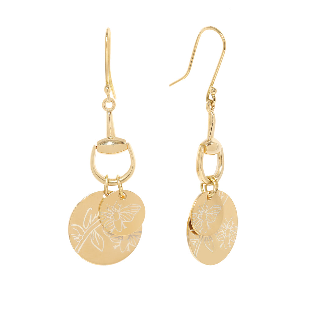 Gucci 18K gold drop earrings with bee motifs, white enamel inlay, horsebit detail, and shepherd’s hook closure.. Side view