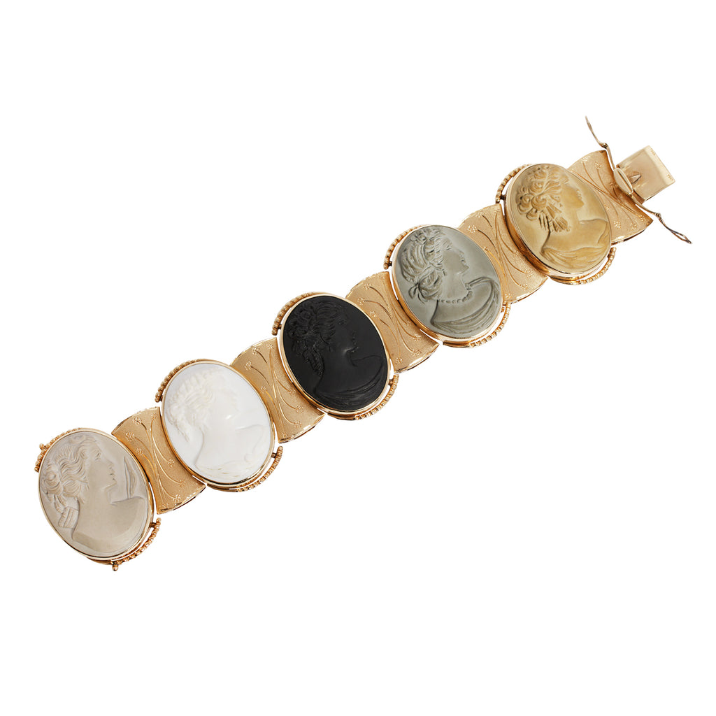 Full view of a lava and agate carved cameos in 14k yellow gold. Grand Tour memento. 