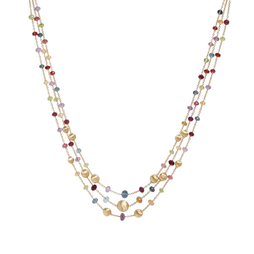 Paradise necklace by Marco Bicego. Three layers of gold chain  with multi-gemstone beads and gold nuggets randomly place.