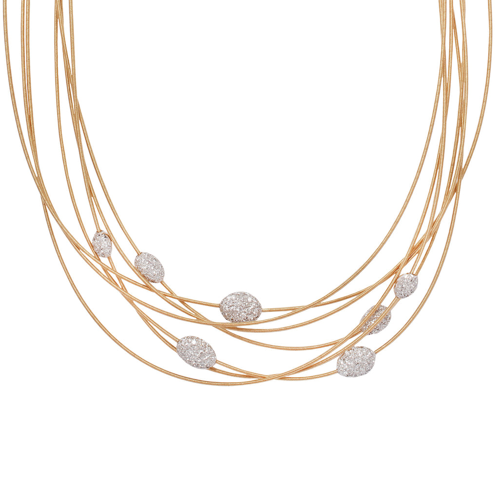 Marco Bicego 18K gold multi-strand necklace with 7 diamond pavé stations, 1.50 CTW, and a 16” shortest strand. Close up view.