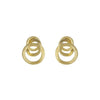 Artistic close-up of Marco Bicego Triple Loop Earrings in hand-engraved 18k yellow gold
