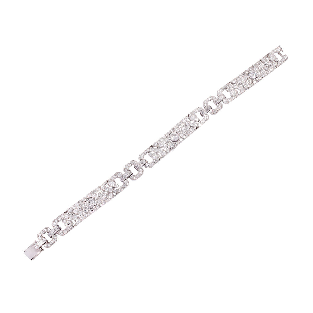 Full length view of a platinum MAUBOUSSIN Art Deco bracelet featuring approximately 8.76 carats of mixed-cut diamonds.