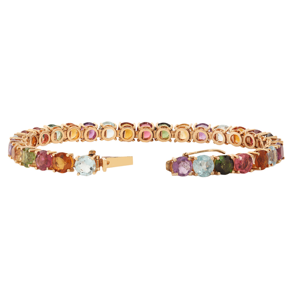 Open clasp, back view of a multi-gemstone 18k yellow gold tennis bracelet.