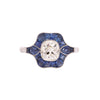 Front view of platinum ring featuring 1.14 ct Old Mine Cut diamond and sapphire halo.