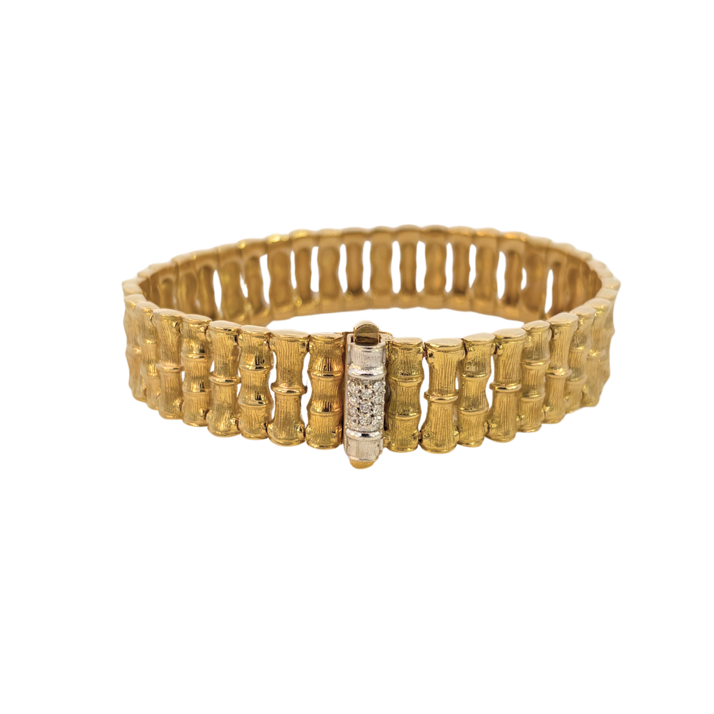 Front view of a Roberto Coin 18K gold bamboo bracelet with a pavé diamond clasp