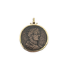 Obverse view of ancient Roman bronze coin pendant with profile bust in 14K gold bezel.