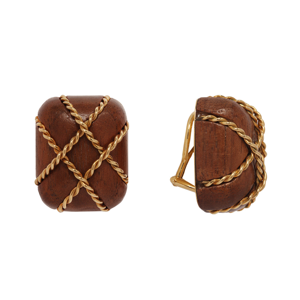 Collectible Seaman Schepps clip-on earrings in carved Rosewood with 18K gold twisted wire cage design. 