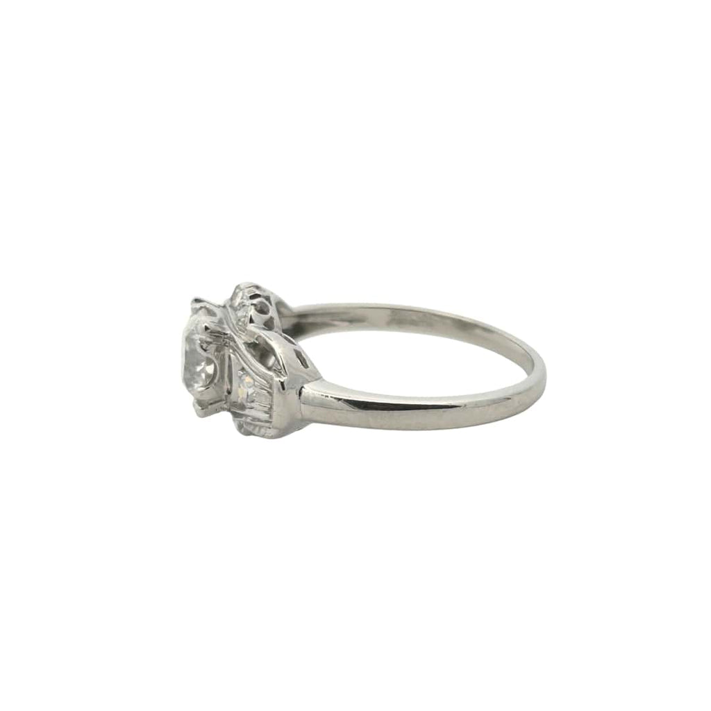 Side view of 1930s platinum Art Deco engagement ring with Old European cut diamond