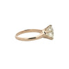 Side profile showing classic six-prong yellow gold mounting and antique diamond proportions