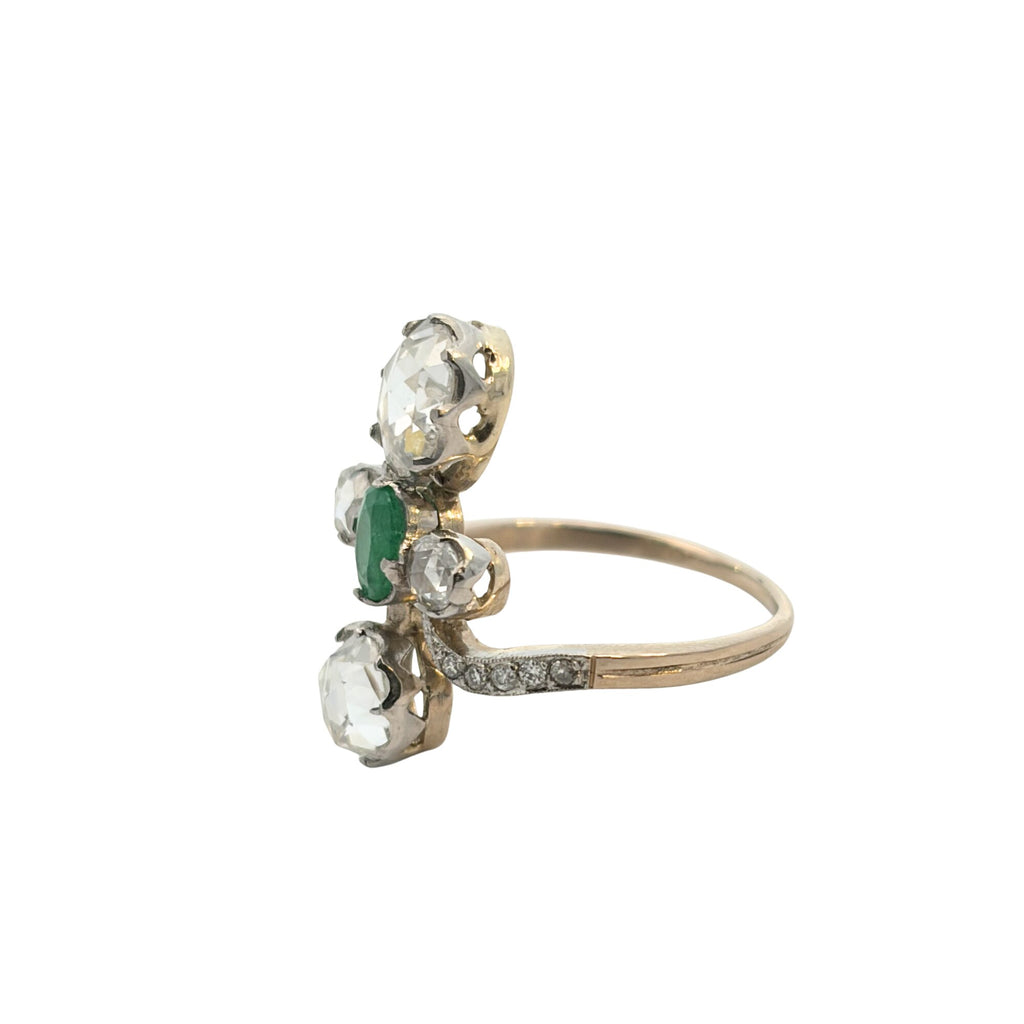 Side view of antique emerald and rose-cut diamond ring in platinum-topped gold