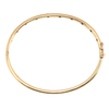 Tiffany & Co. Etoile yellow gold bangle with flush-set diamond gemstones in platinum bezels, side view