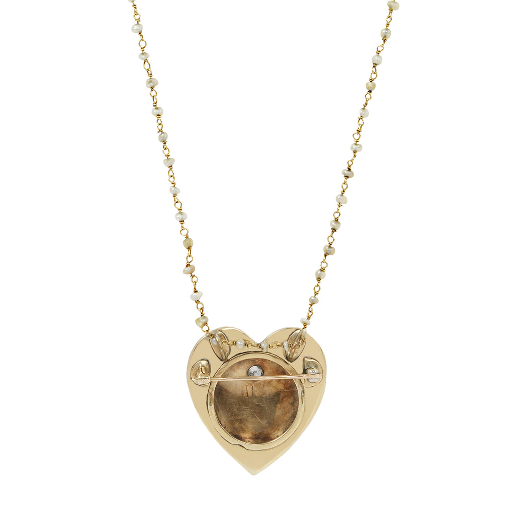 Back view of a vintage Victorian Heart Pearl and Diamond necklace. Can be worn as a brooch and space for a photograph.