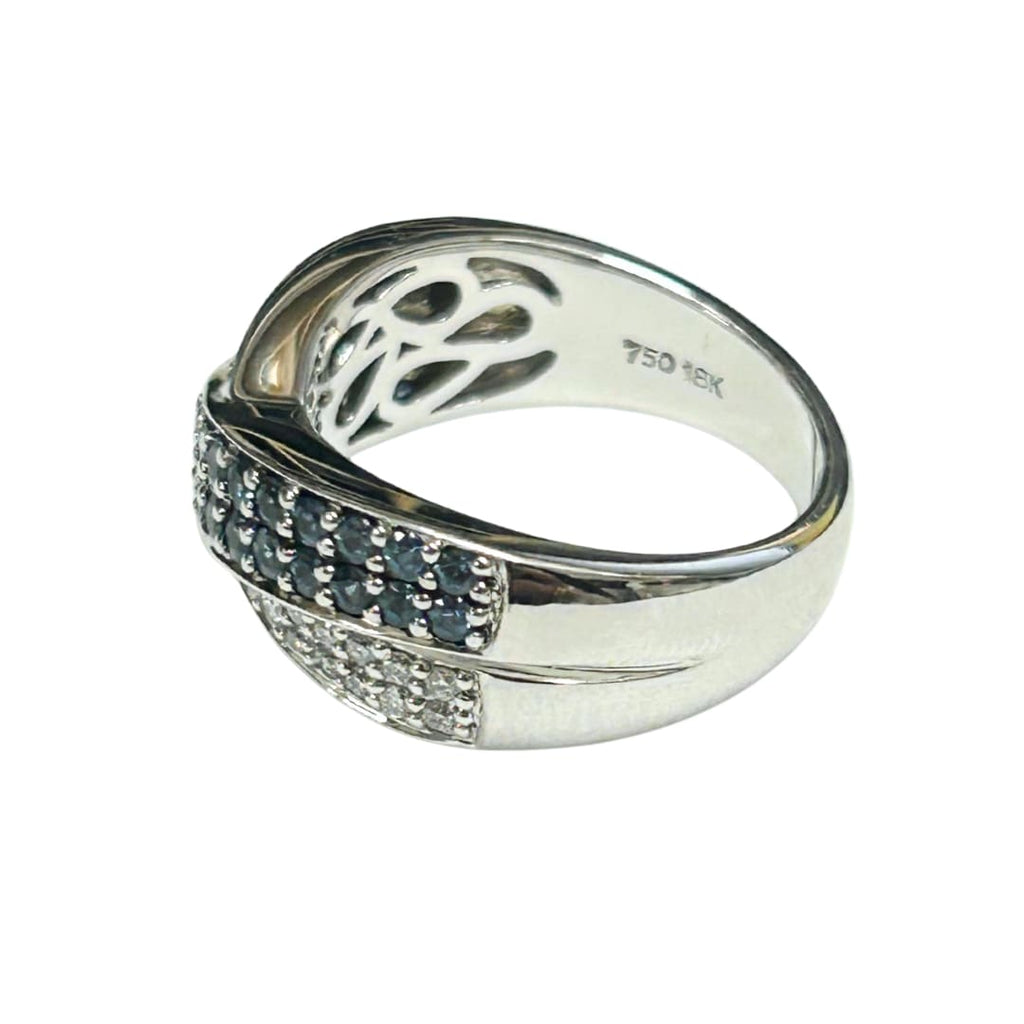 Side view of alexandrite and diamond crossover ring in white gold