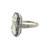 Platinum Art Deco double diamond and sapphire halo dinner ring showing engraved shoulders and milgrain detail