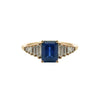 Emerald-cut sapphire ring with graduated baguette diamonds in 18k yellow gold – front view