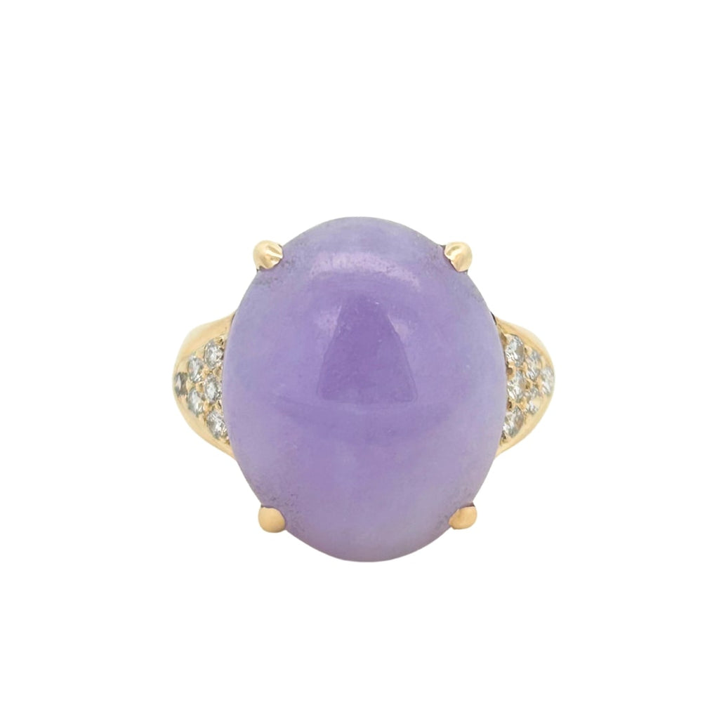 Front view of a vintage Gump’s 18k yellow gold ring with a GIA-certified lavender jade cabochon and pavé diamond accents.