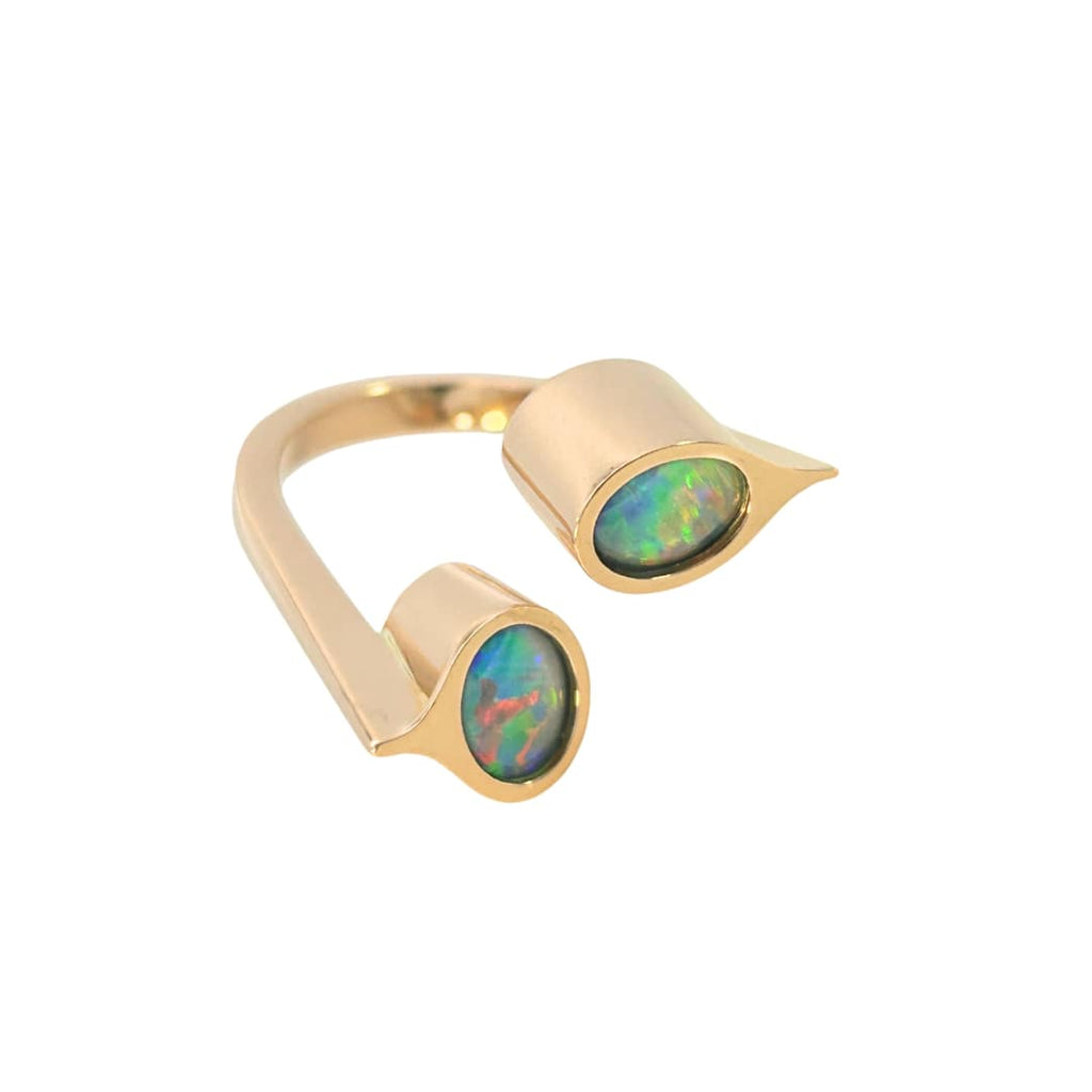 Contemporary 18k yellow gold ring with two oval opal triplets in deep bezels, set at opposite each other on an open shank.