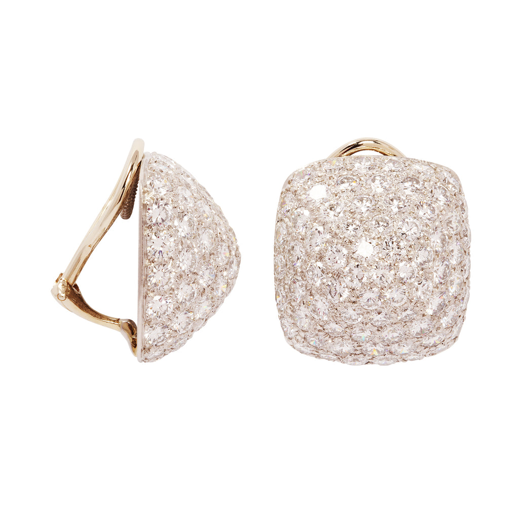 Front and angled views of pavé diamond sugarloaf dome earrings by Oscar Heyman with 142 brilliant-cut diamonds. Side view