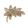 Oscar Heyman 18k yellow gold diamond flower earrings and brooch set, featuring round brilliant cut diamonds totaling approx. 10.00 carats.