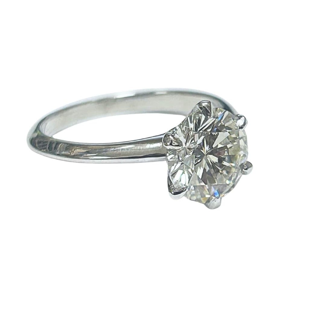 Angled view of Tiffany & Co. platinum engagement ring with 2.41ct round brilliant diamond.