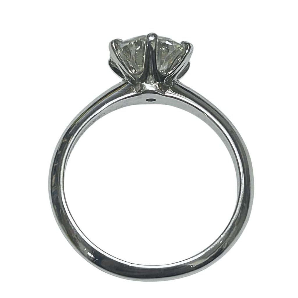 Prong detail of Tiffany & Co. platinum engagement ring with GIA-certified 2.41ct diamond.