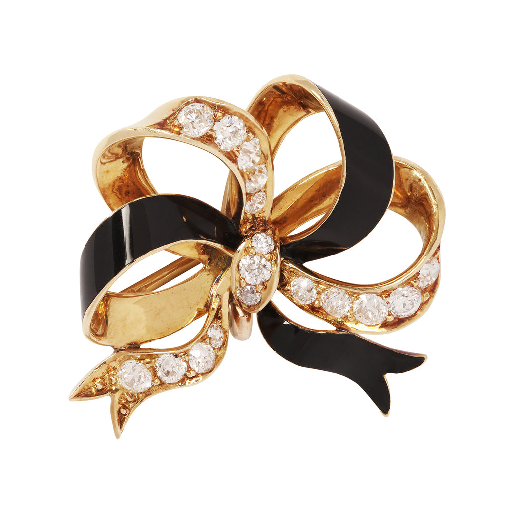 Front of Tiffany bow brooch showing diamonds and enamel.