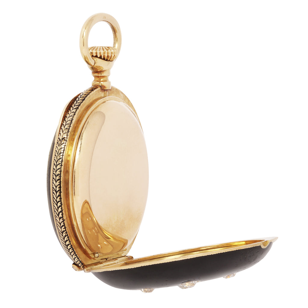 Side view with the gold cover open, showing the hinged construction.