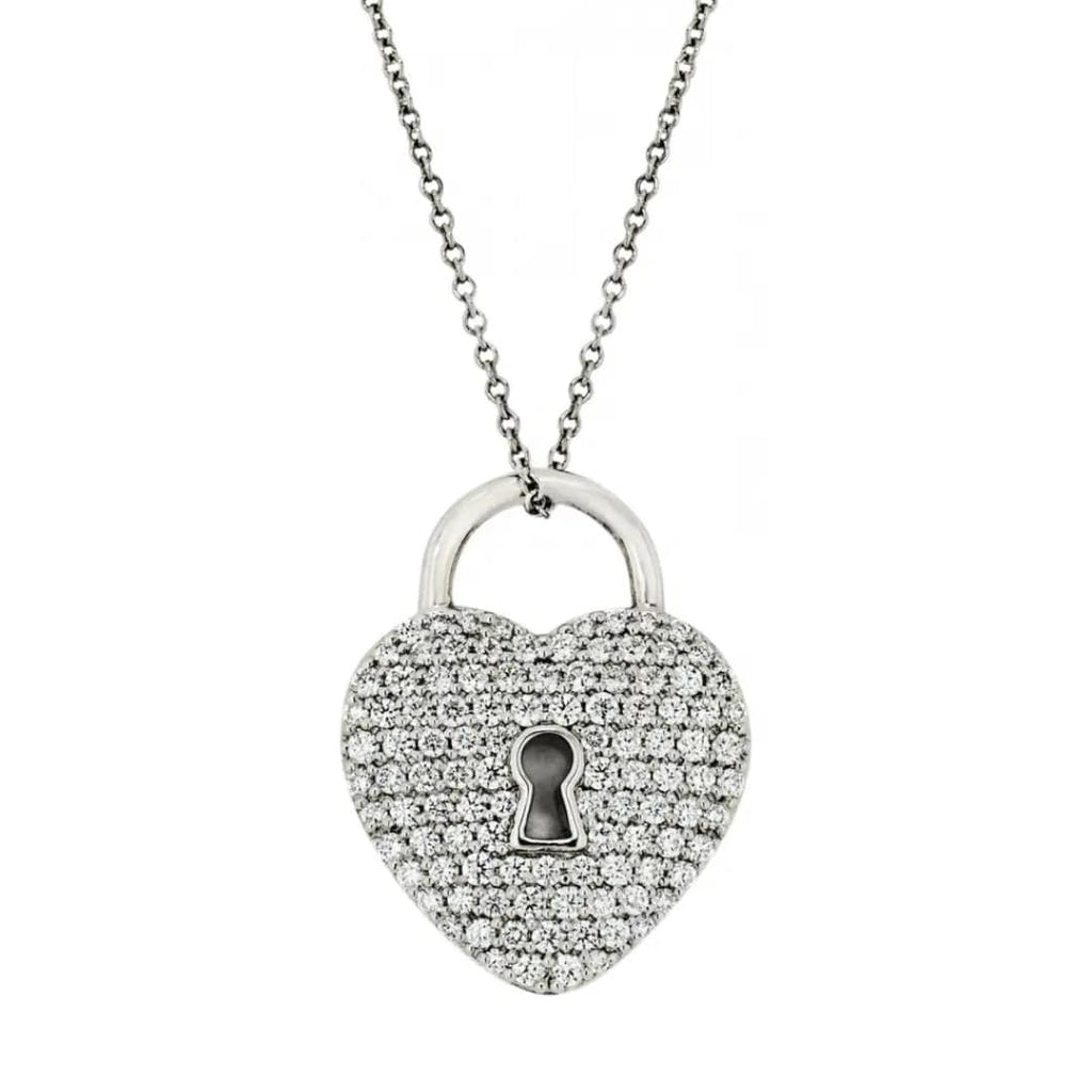 Tiffany & Co. platinum heart-shaped padlock pendant pavé-set with round brilliant-cut diamonds, suspended from a platinum chain. 